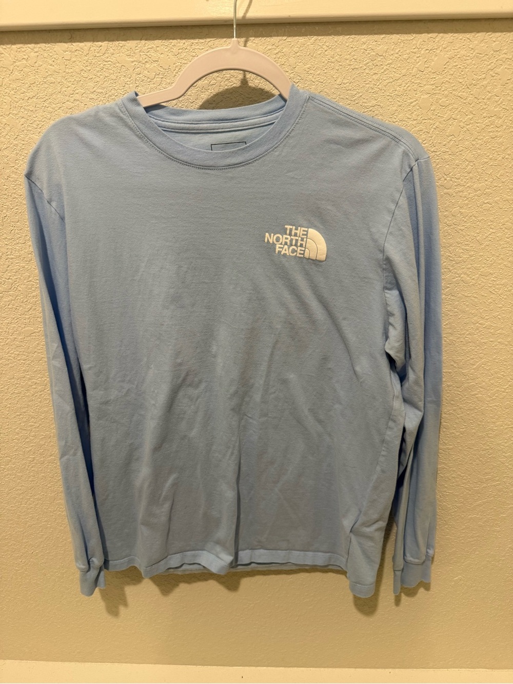 The North Face Men's Long-Sleeve Crew in Pale Blue with White Logo